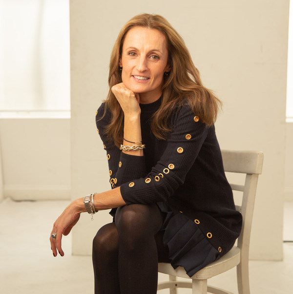 Portrait of Tarah Comonte, CEO of TMRW.